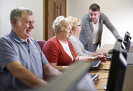 senior citizens learning computer skills